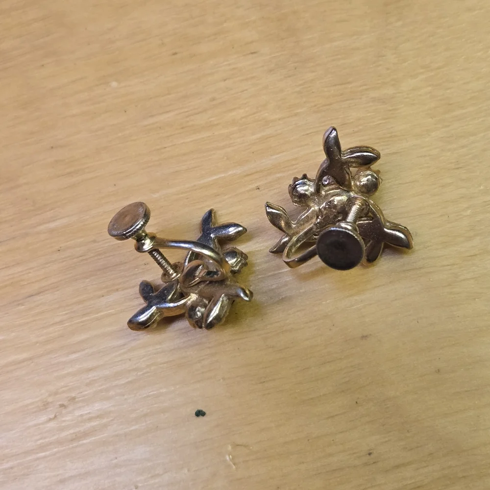 Vintage clip on gold tone earrings with faux pearl accents